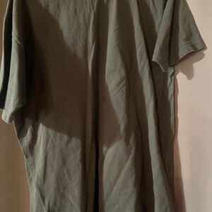 Green t-shirt with deer on front.